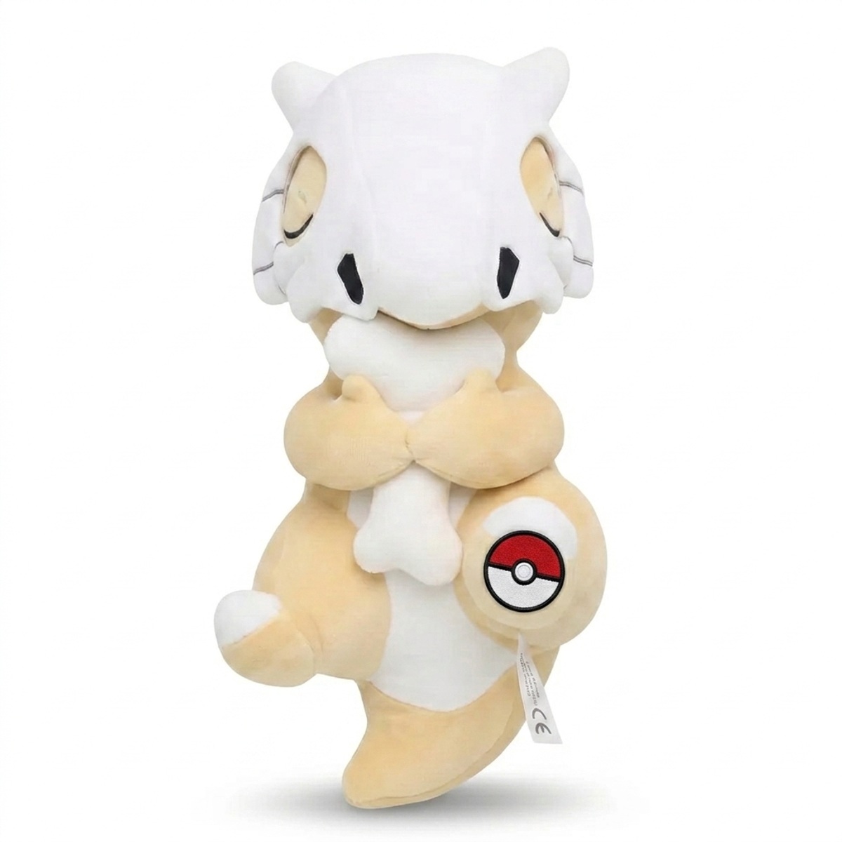 Peluche Cubone con distintivo che prova l'autenticità del prodotto.