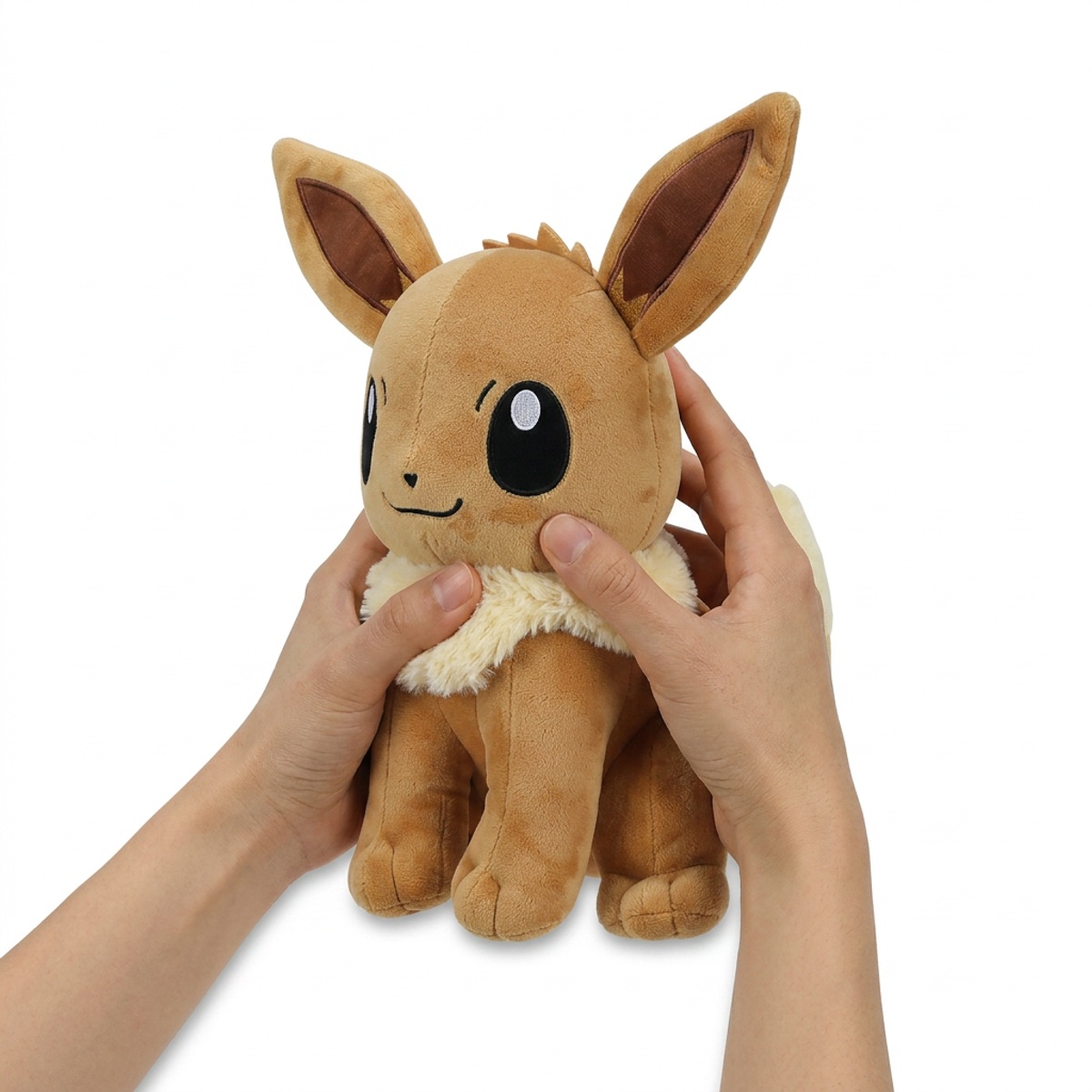 Peluche Eevee 30 cm tenuta nelle mani