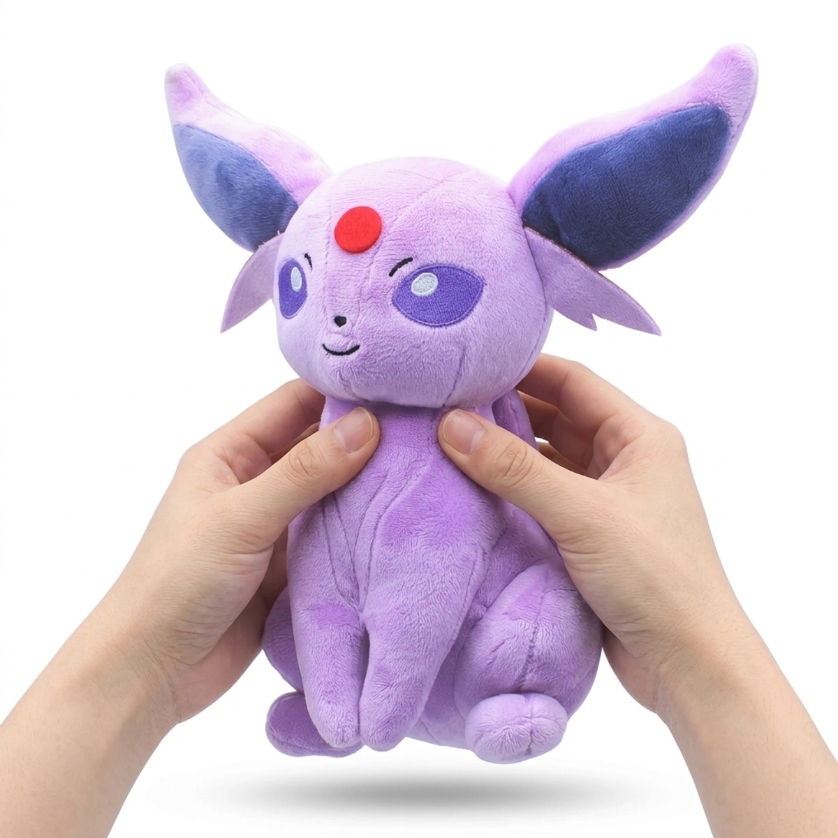 Peluche Espeon tenuta nelle mani
