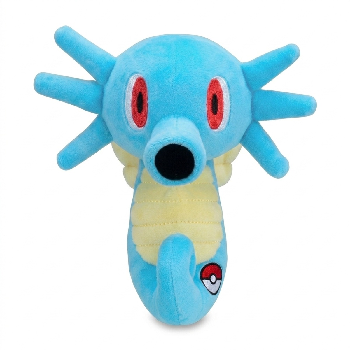 Peluche Horsea con distintivo che prova l'autenticità del prodotto.