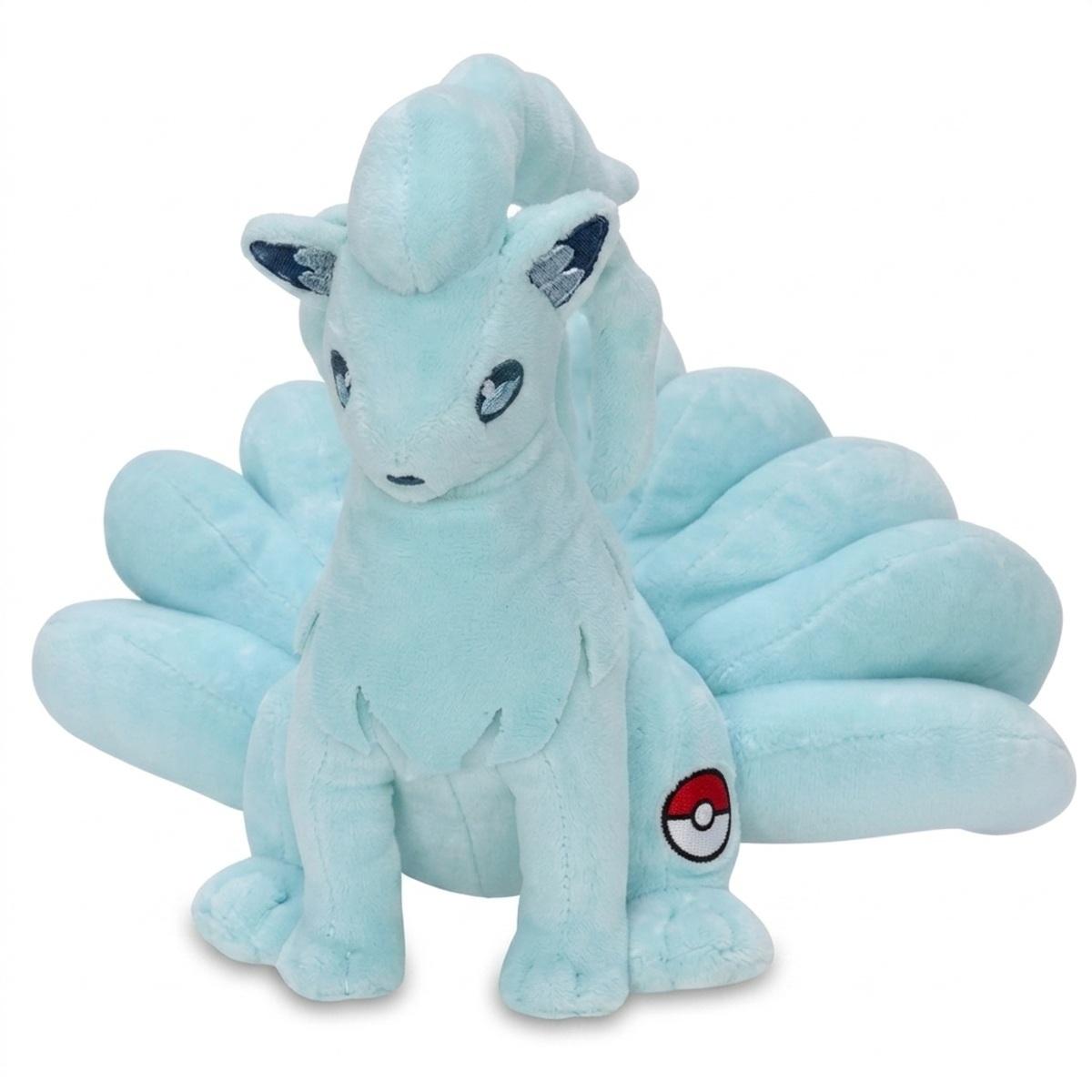 Peluche Ninetales con distintivo che prova l'autenticità del prodotto.
