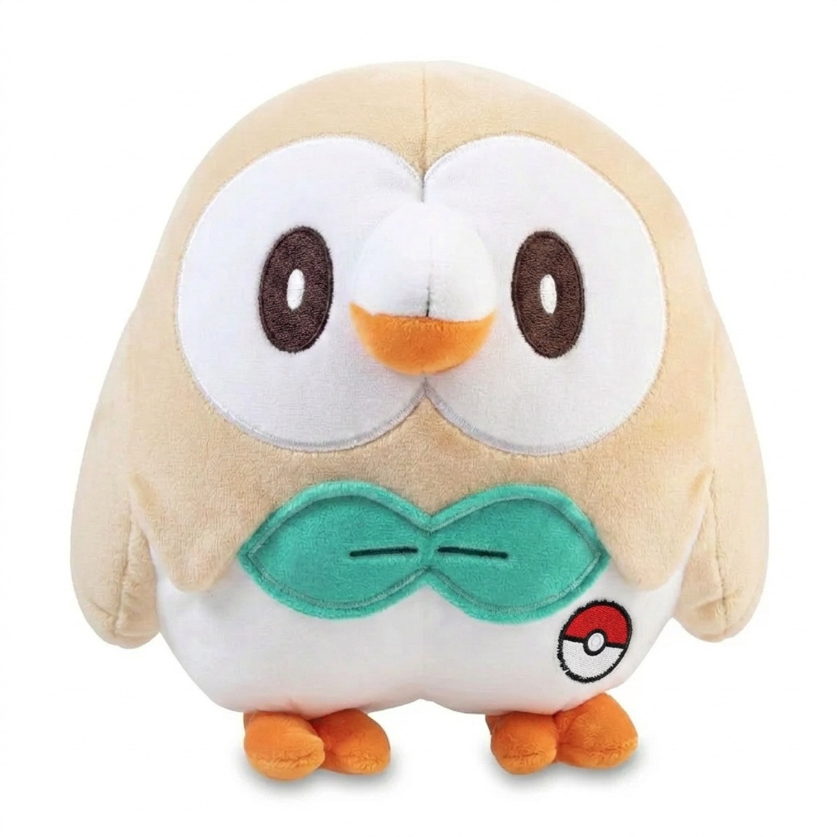 Peluche Rowlet con distintivo che prova l'autenticità del prodotto.