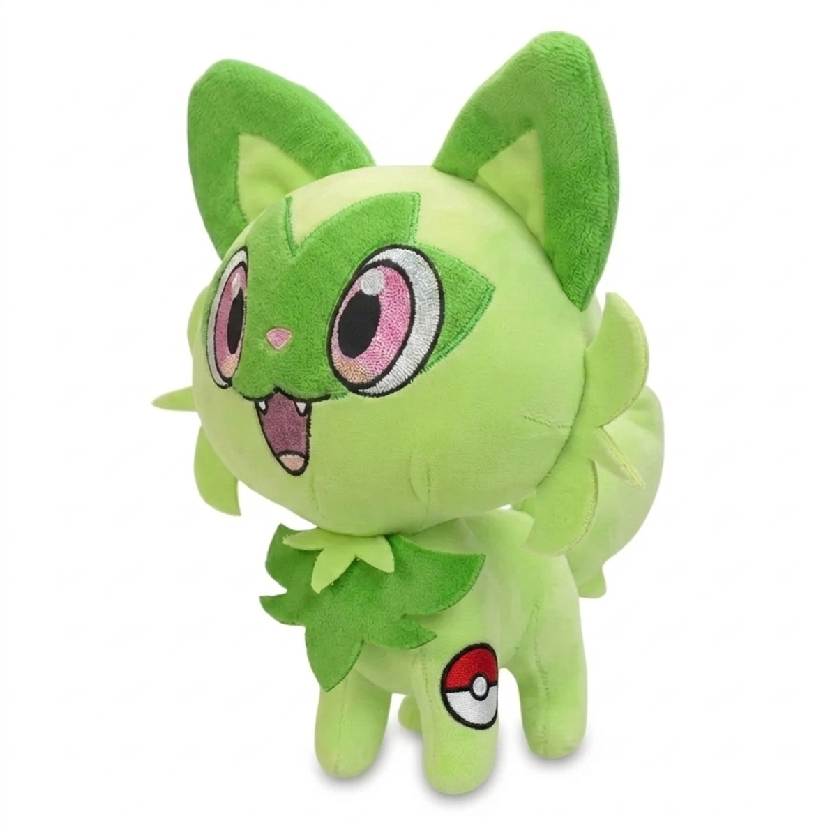 Peluche Sprigatito con distintivo che prova l'autenticità del prodotto.