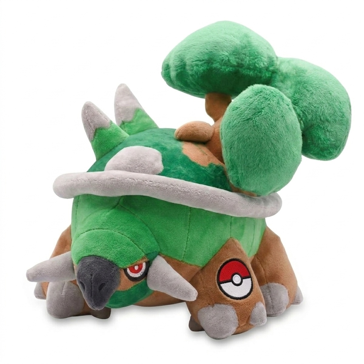 Peluche Torterra con distintivo che prova l'autenticità del prodotto.