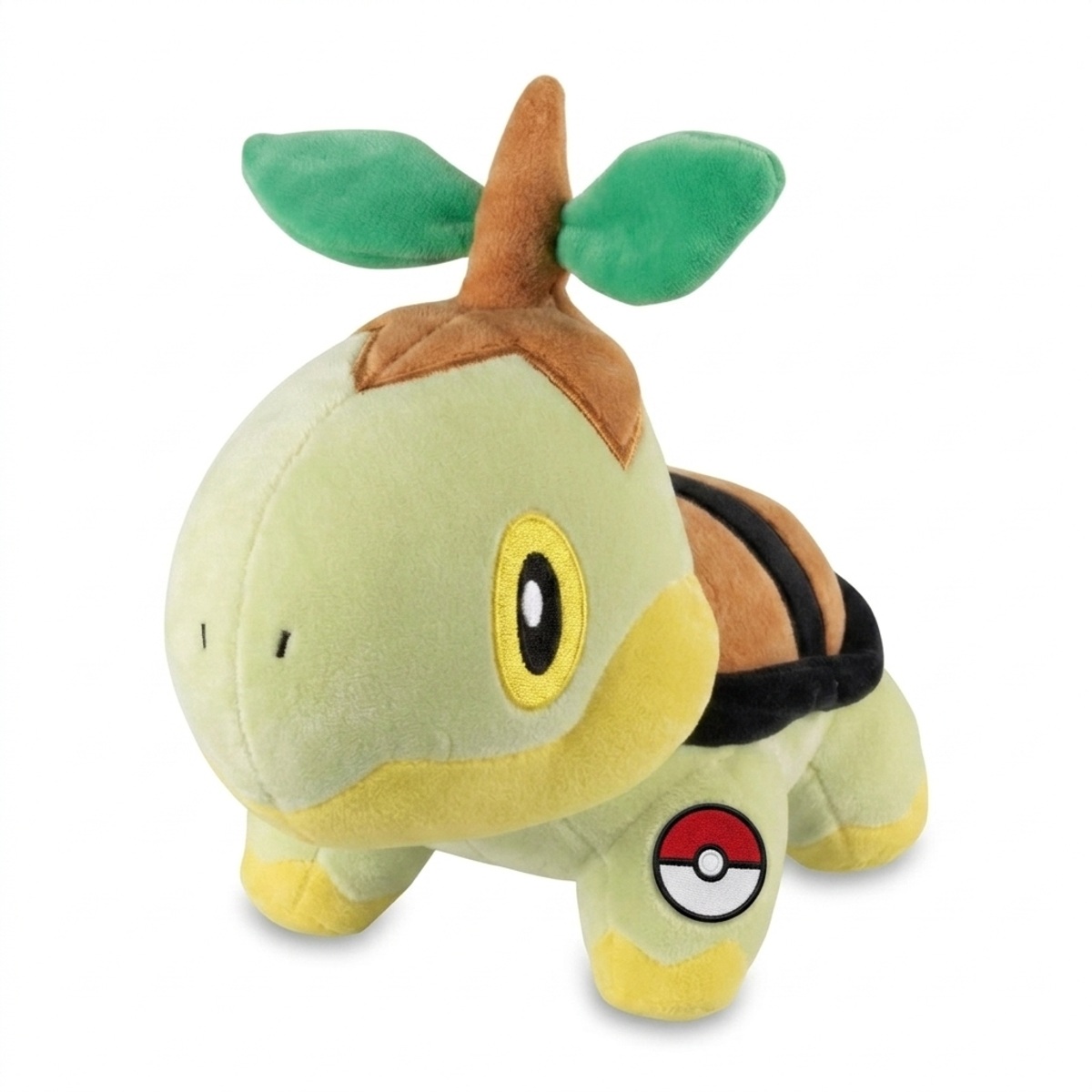 Peluche Turtwig con distintivo che prova l'autenticità del prodotto.