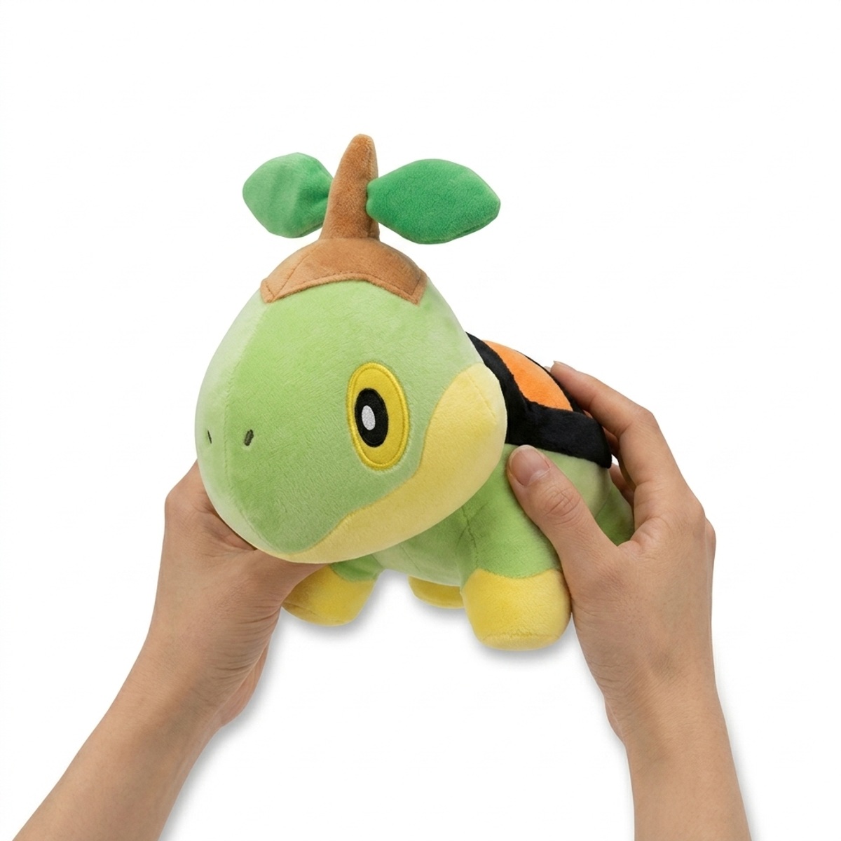 Peluche Turtwig tenuto in mano