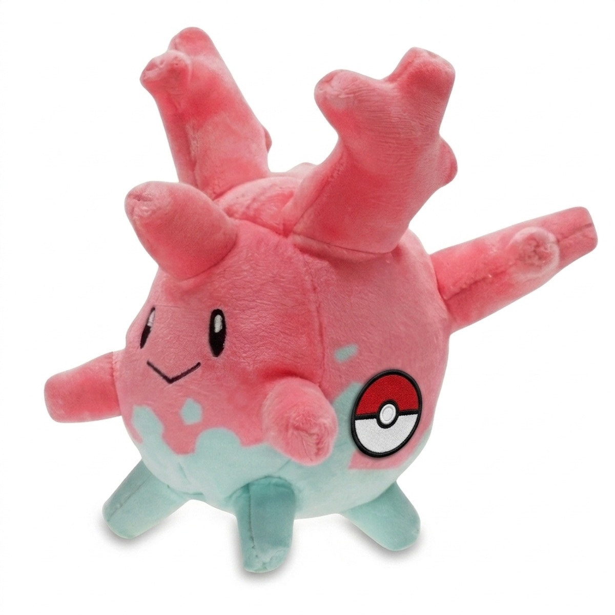 Peluche Corsola con distintivo che prova l'autenticità del prodotto.