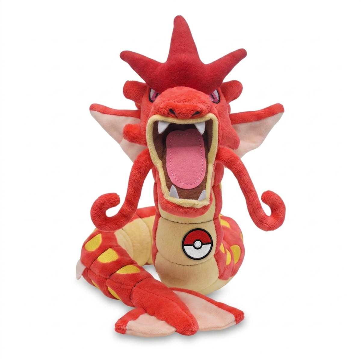 Peluche Gyarados con distintivo che prova l'autenticità del prodotto.