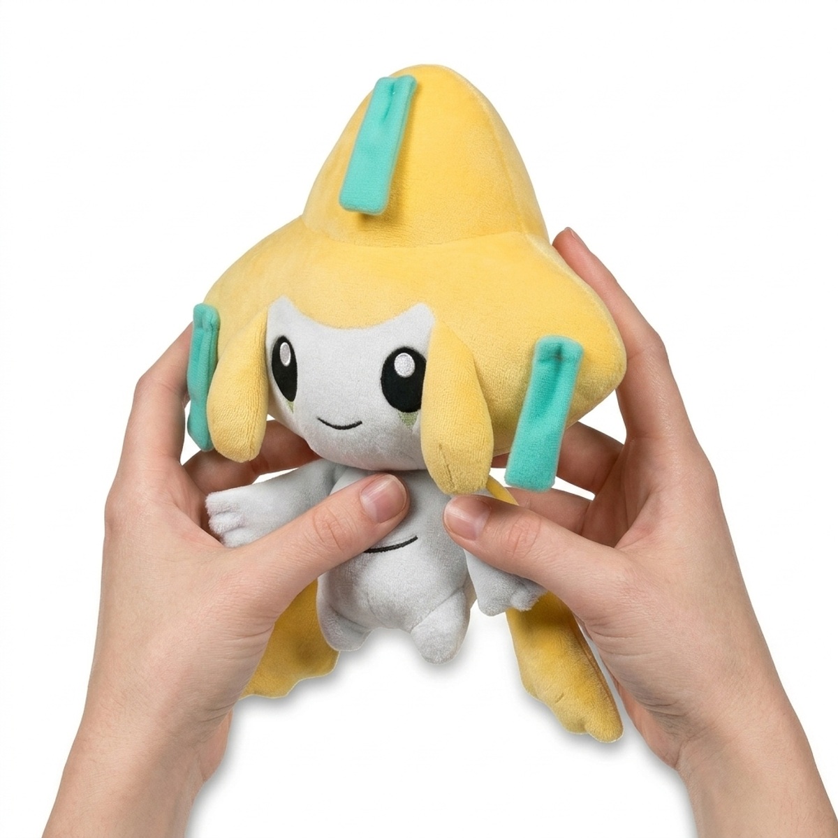 Peluche Jirachi tenuta nelle mani