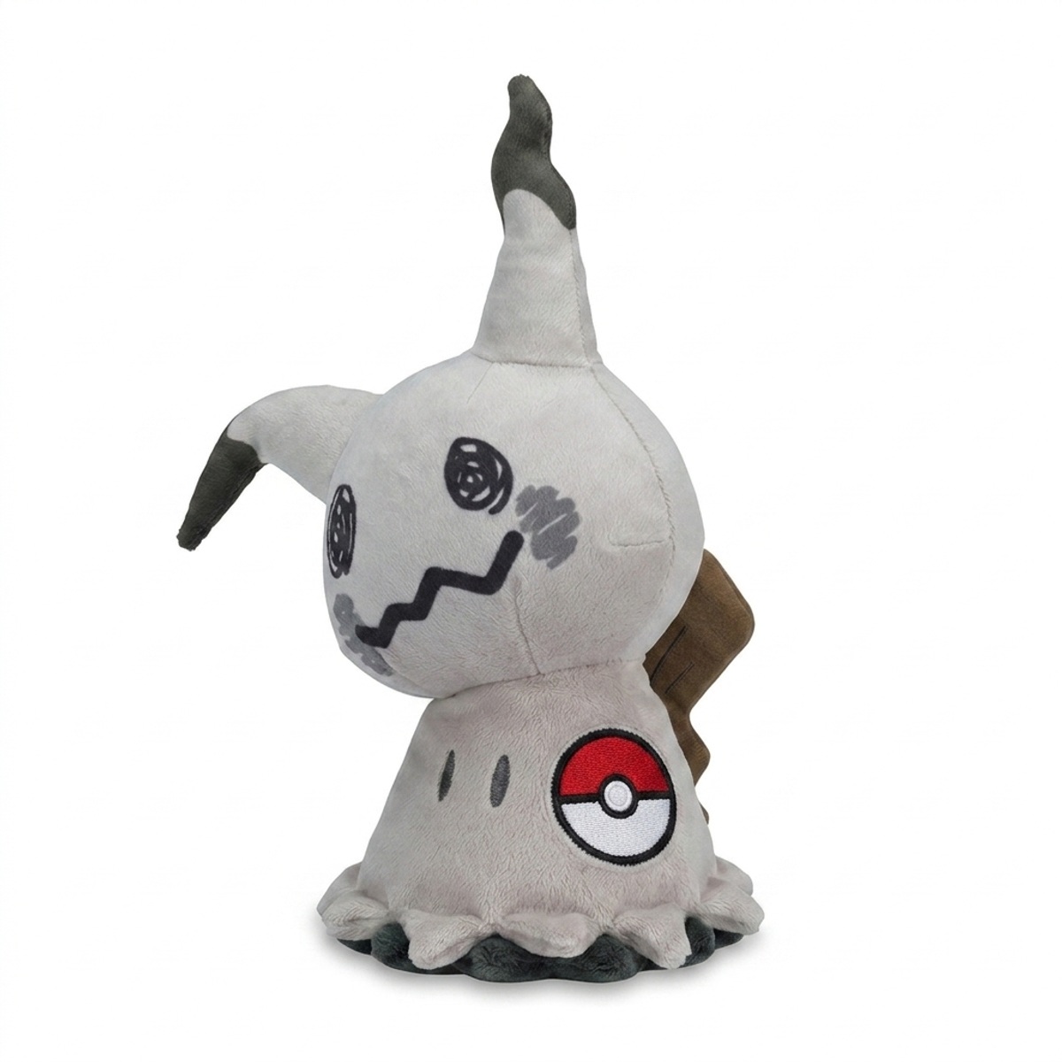 Peluche Mimikyu con distintivo che prova l'autenticità del prodotto.