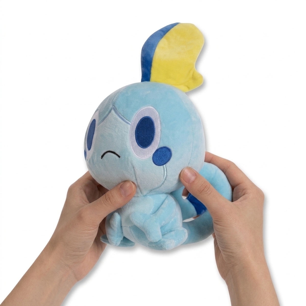 Peluche Sobble tenuta nelle mani