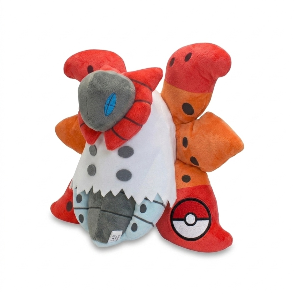 Peluche Volcarona con distintivo che prova l'autenticità del prodotto.