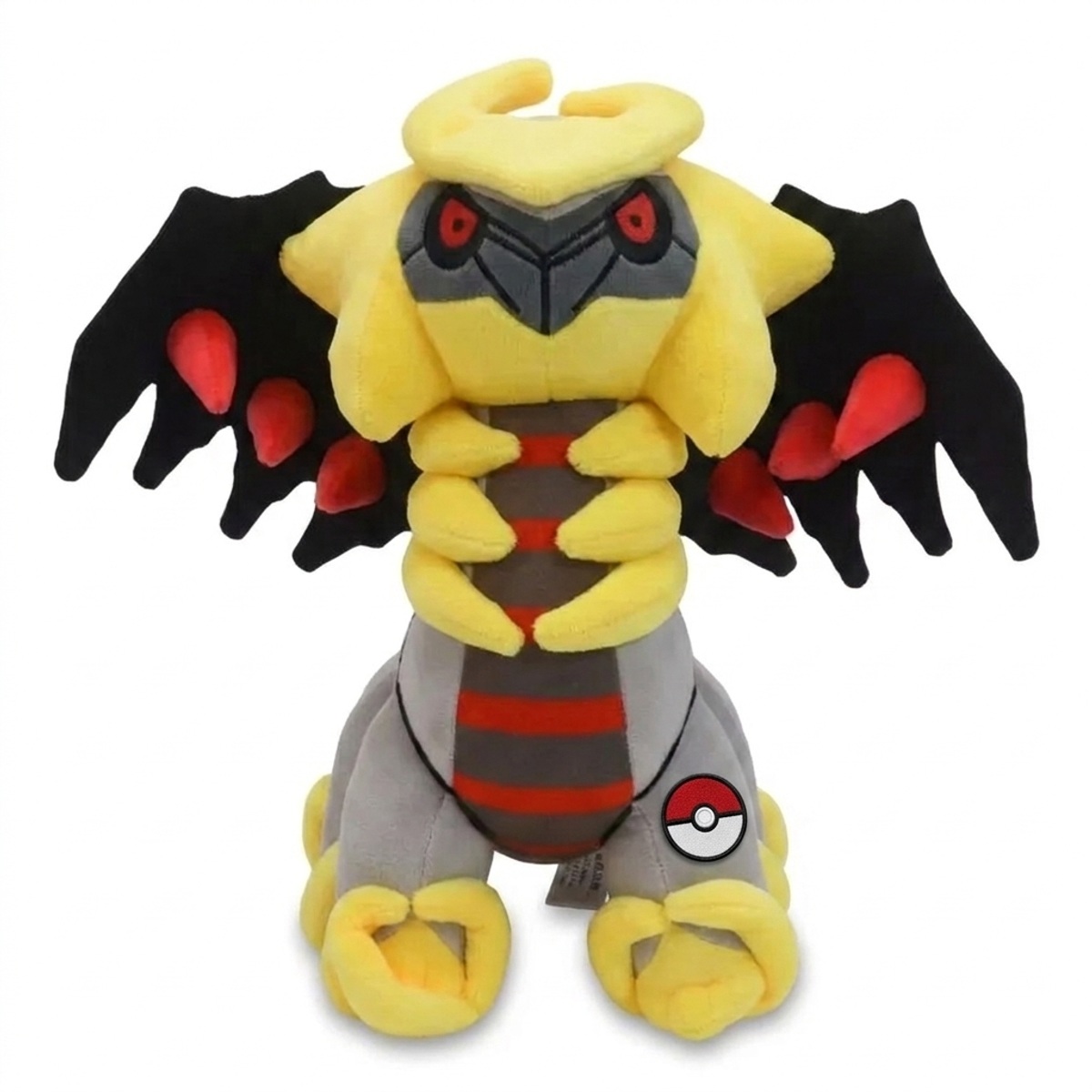 Peluche Giratina con distintivo che prova l'autenticità del prodotto.