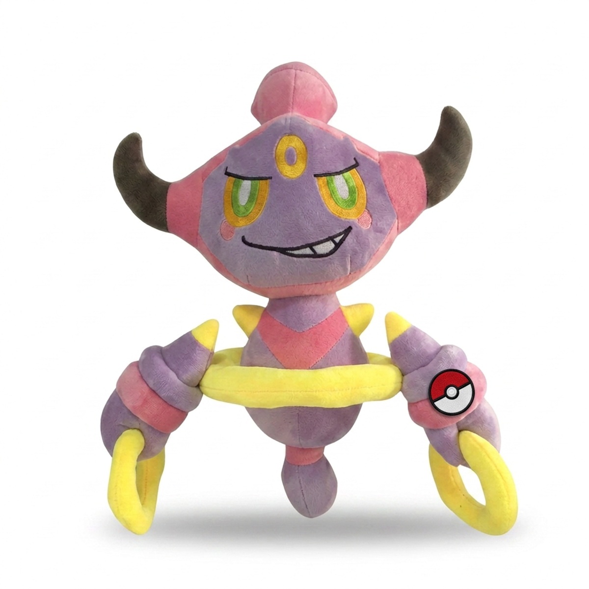 Peluche Hoopa con distintivo che prova l'autenticità del prodotto.