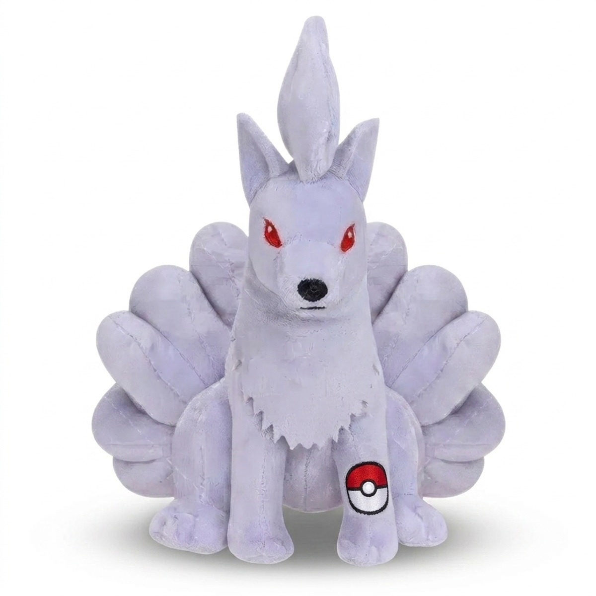 Peluche Ninetales con distintivo che prova l'autenticità del prodotto.