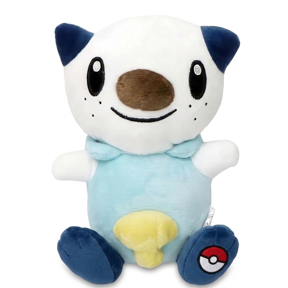 Peluche Oshawott con distintivo che prova l'autenticità del prodotto.