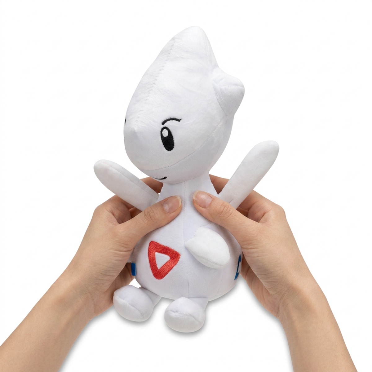 Peluche Togetic tenuta nelle mani